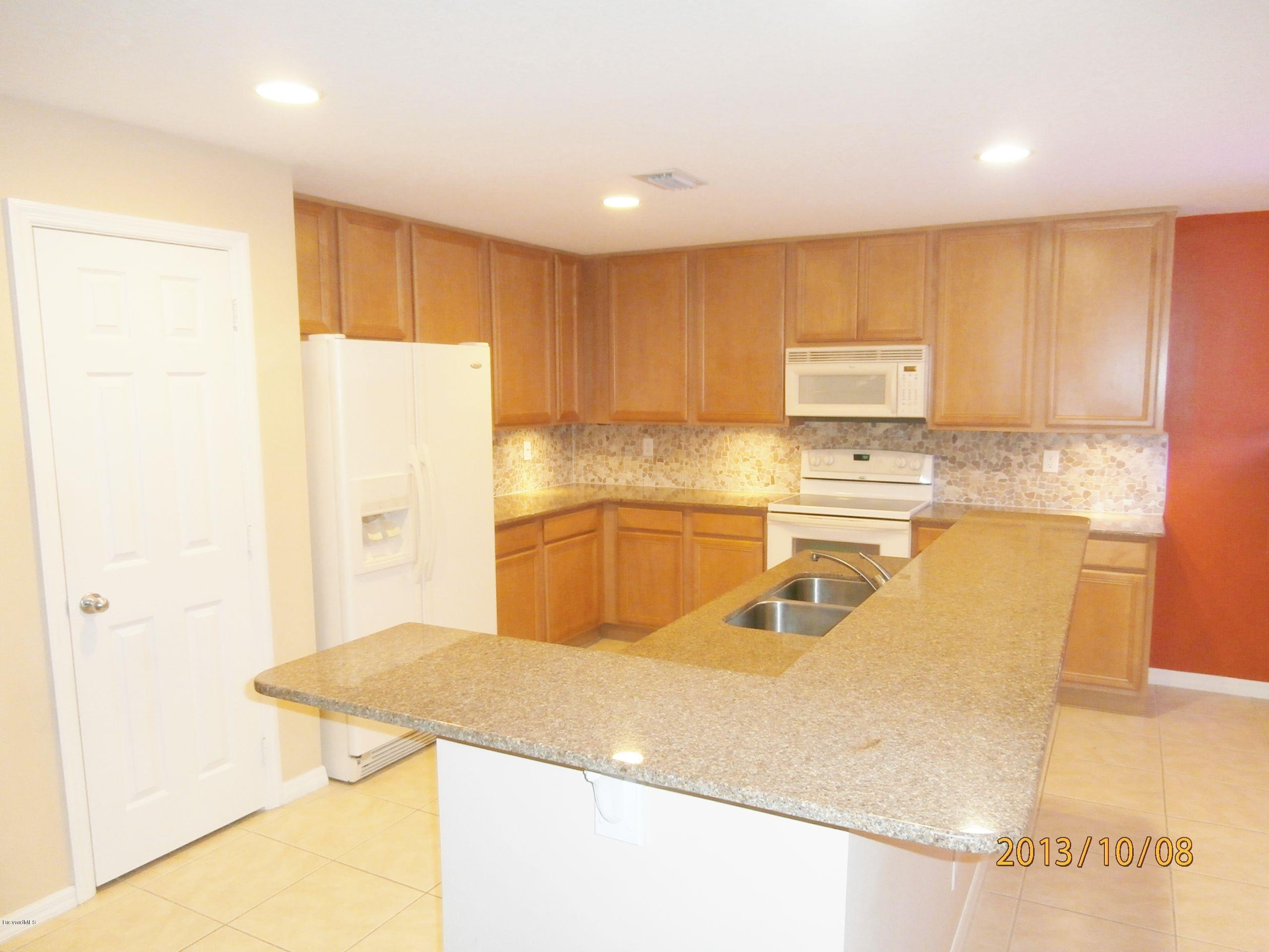 196 Scotch Street Southwest Palm Bay, FL 32908 - Photo 3 of 24 Scotch Kitchen