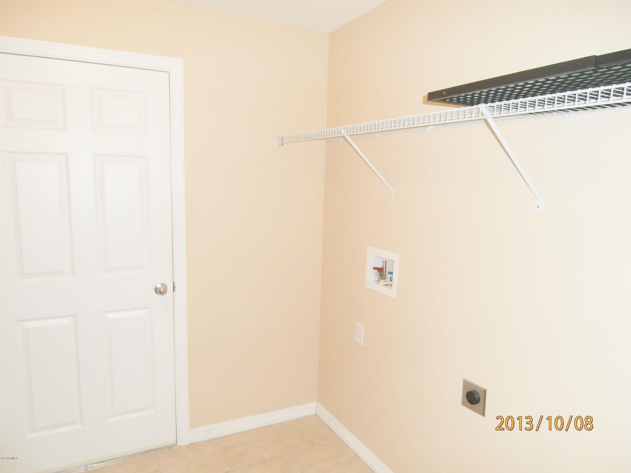 196 Scotch Street Southwest Palm Bay, FL 32908 - Photo 22 of 24 Scotch indoor laundry