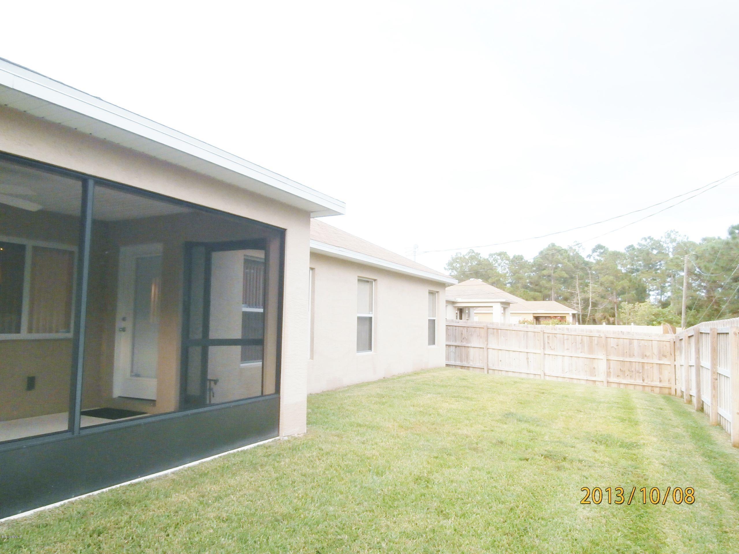 196 Scotch Street Southwest Palm Bay, FL 32908 - Photo 24 of 24 Scotch back yard