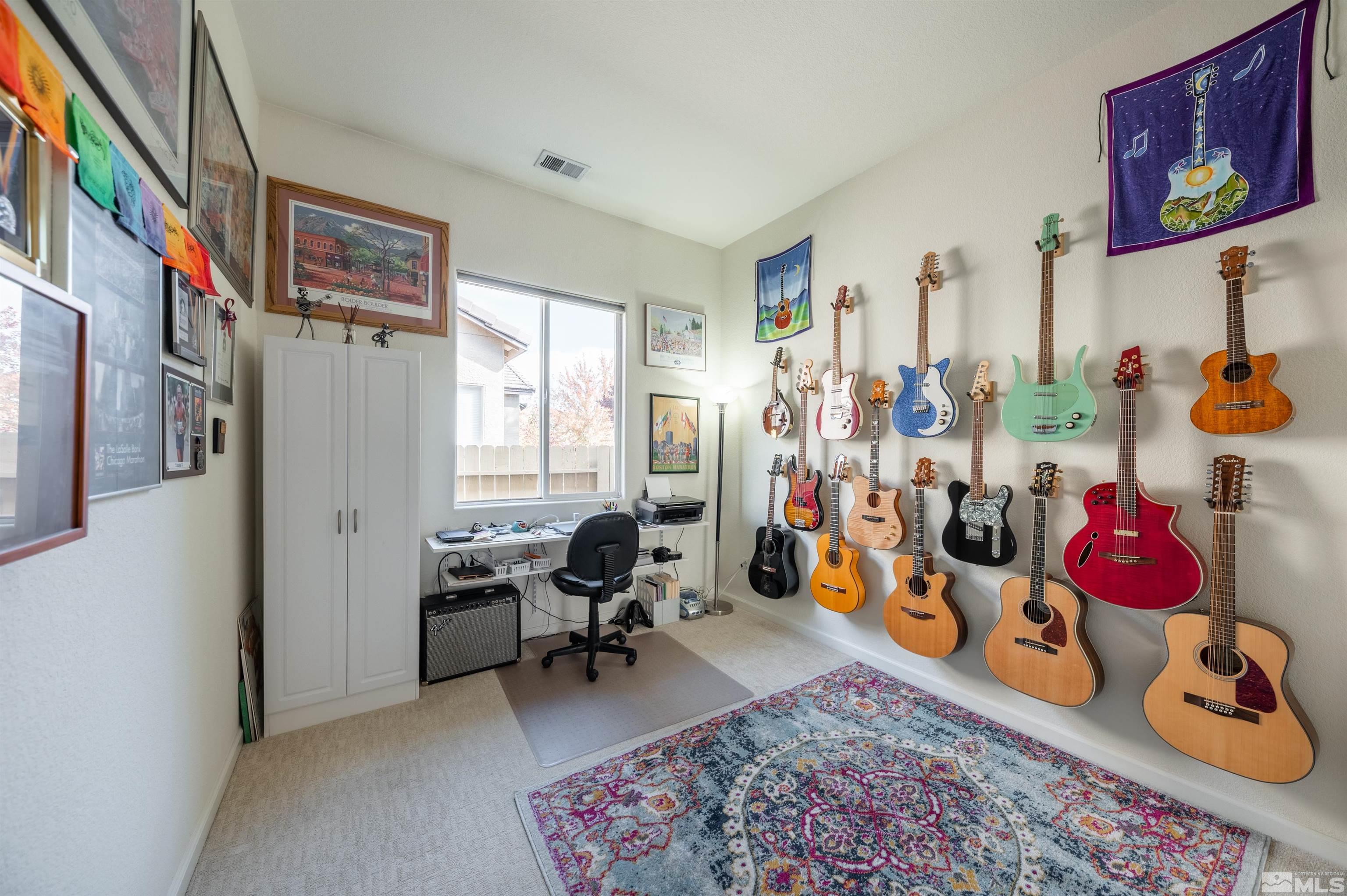 10518 Crystal Bay Drive Reno, NV 89521 - Photo 24 of 39 a bed room with a bed and a window