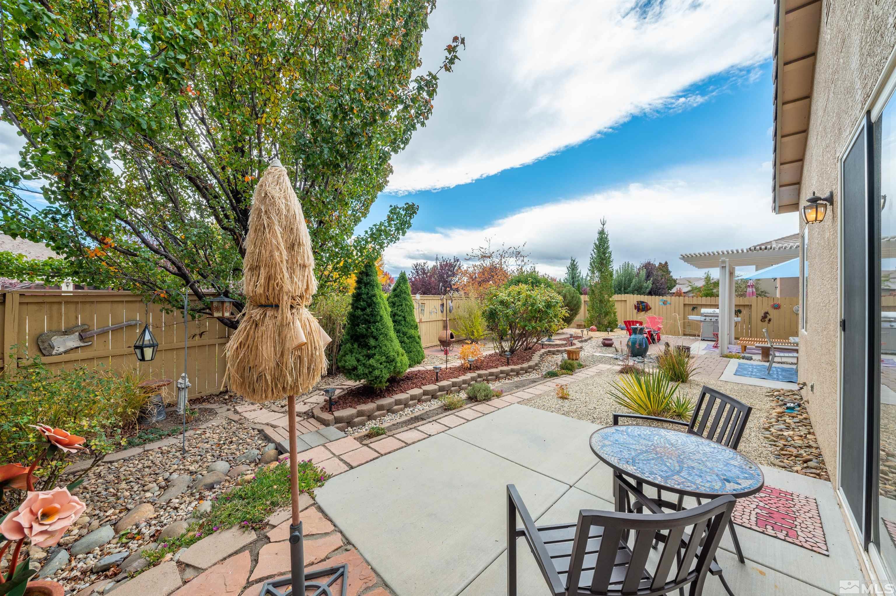 10518 Crystal Bay Drive Reno, NV 89521 - Photo 29 of 39 a view of a patio with a table and chairs