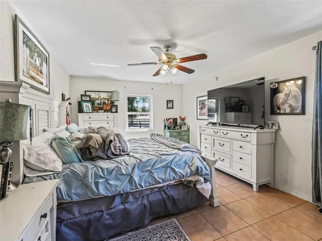 a kitchen with granite countertop a sink stove and cabinets