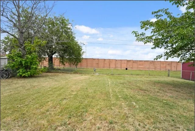 a view of an outdoor space and a yard