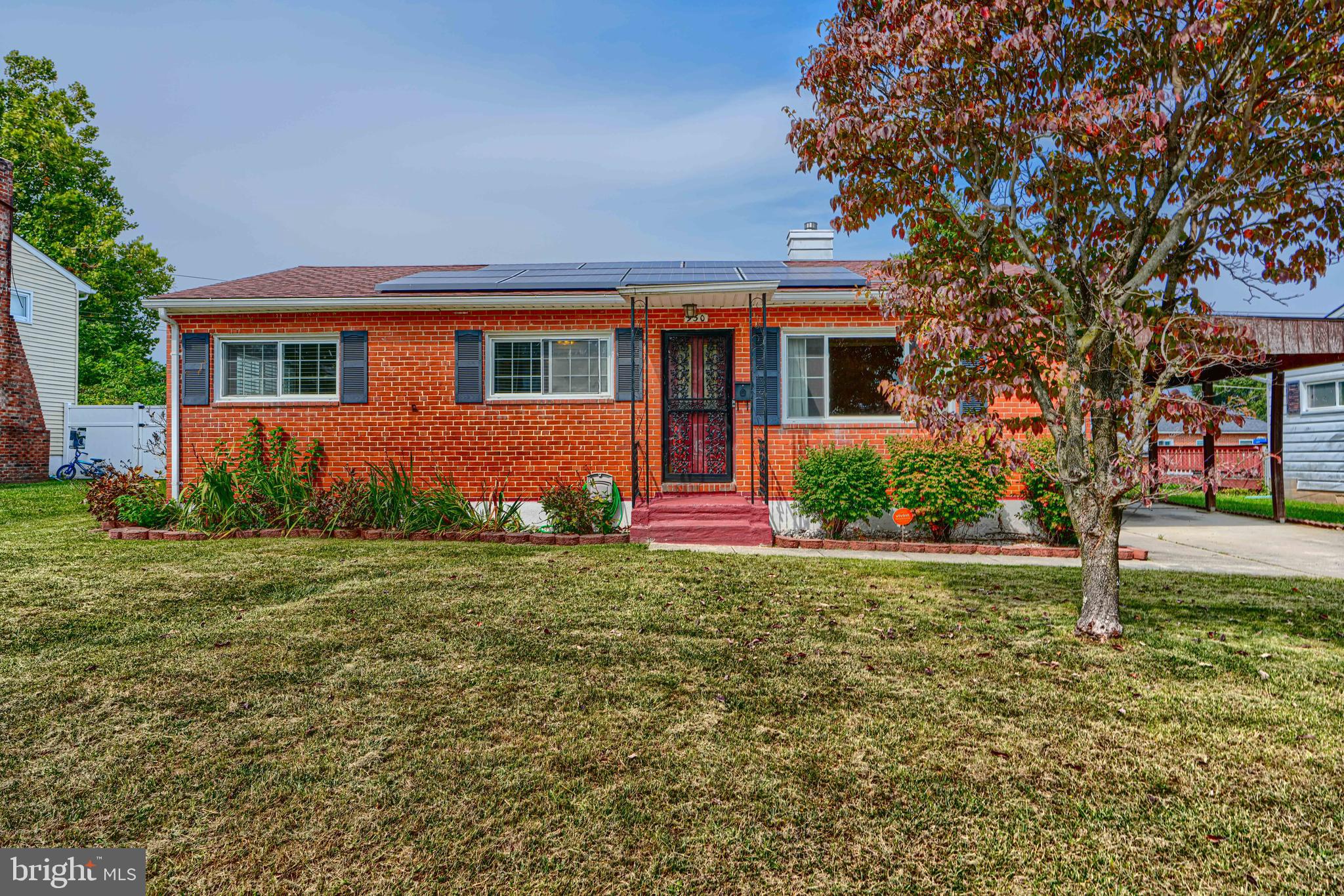 930 Sedgley Road Baltimore, MD 21228 - Photo 1 of 43 a front view of a house with garden