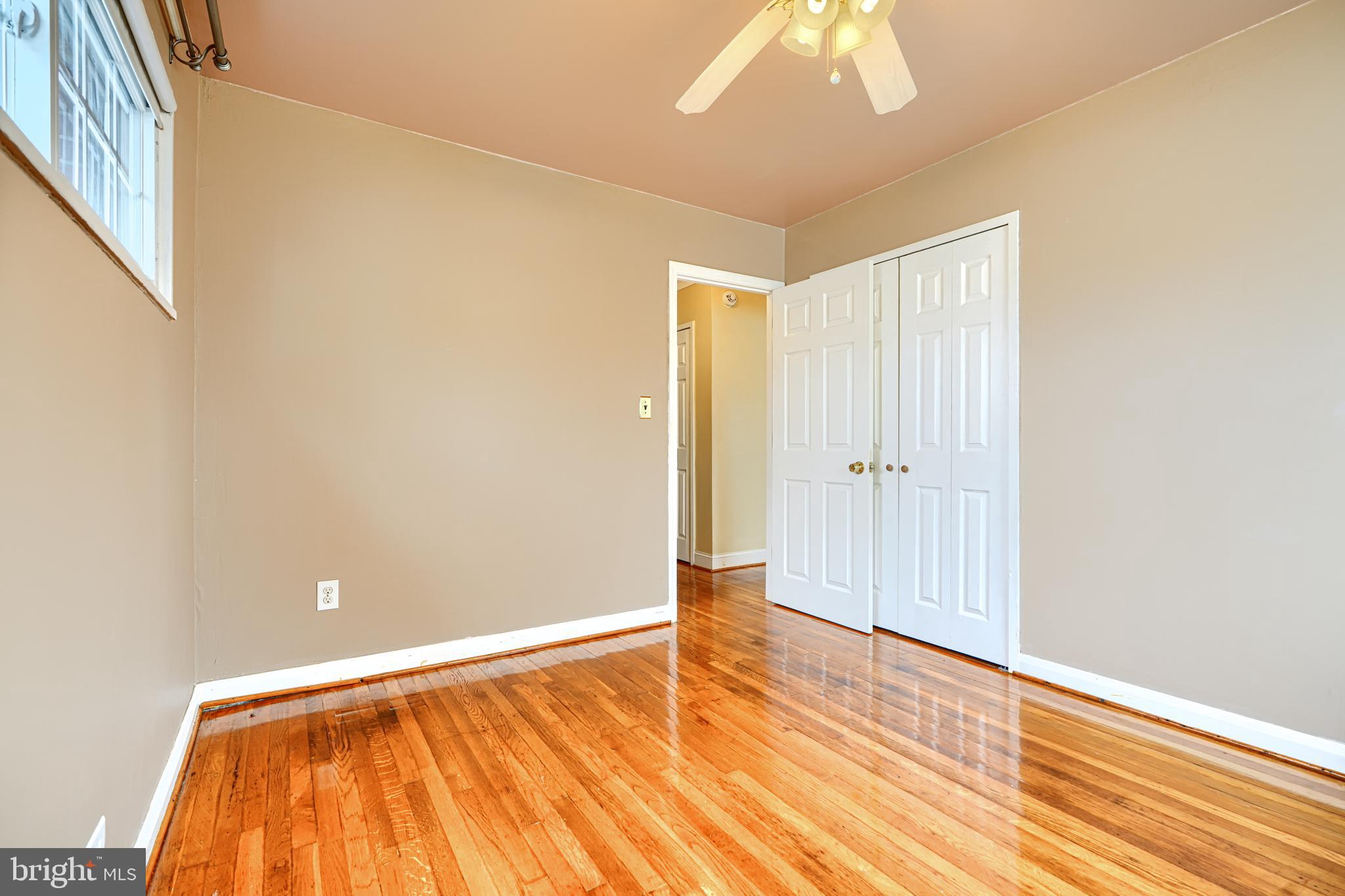 930 Sedgley Road Baltimore, MD 21228 - Photo 23 of 43 a view of room with wooden floor
