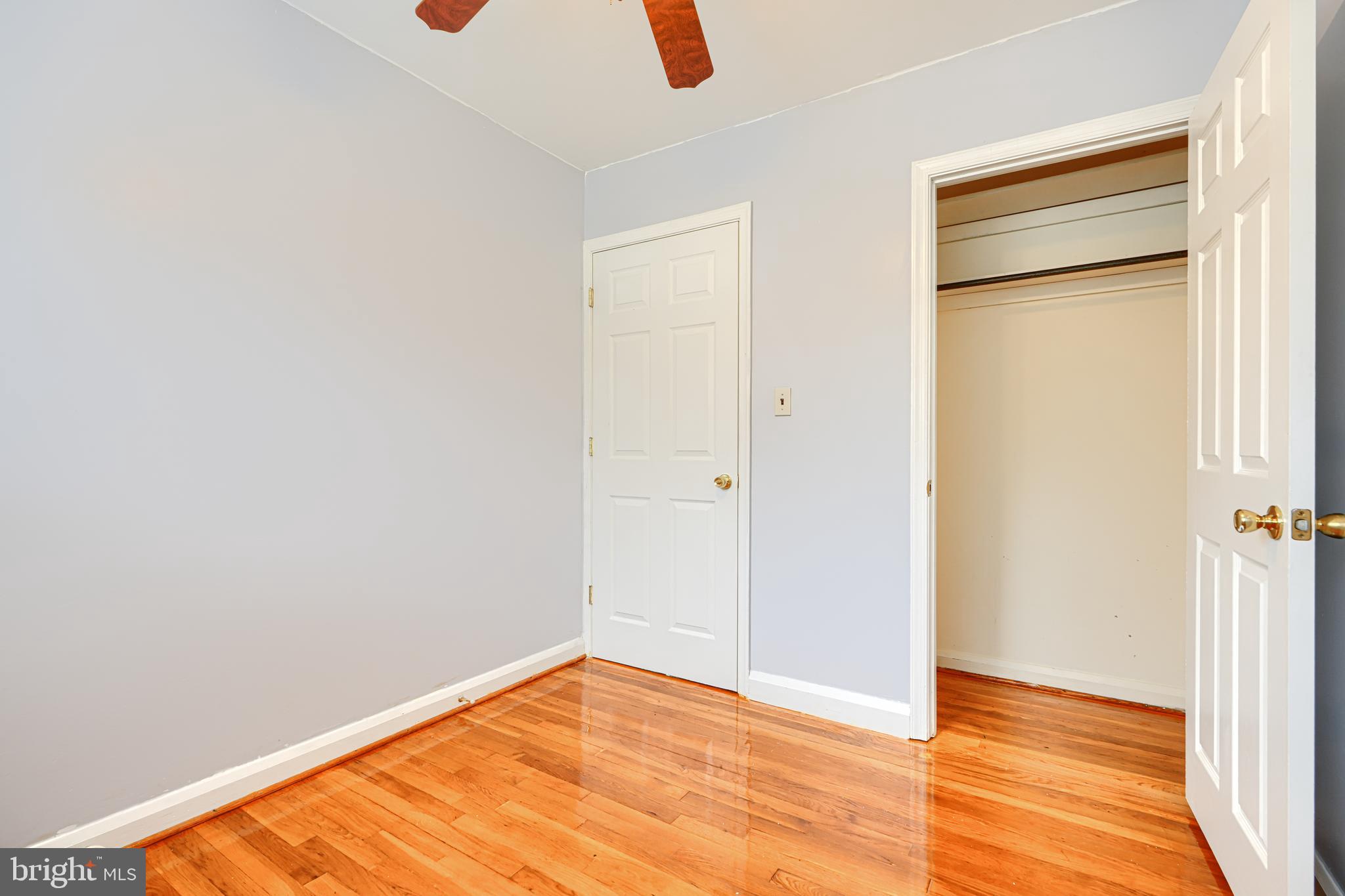 930 Sedgley Road Baltimore, MD 21228 - Photo 28 of 43 a view of empty room with wooden floor