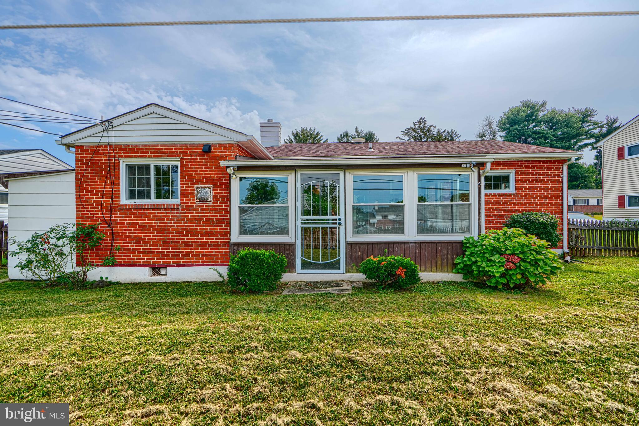 930 Sedgley Road Baltimore, MD 21228 - Photo 38 of 43 front view of a house with a yard