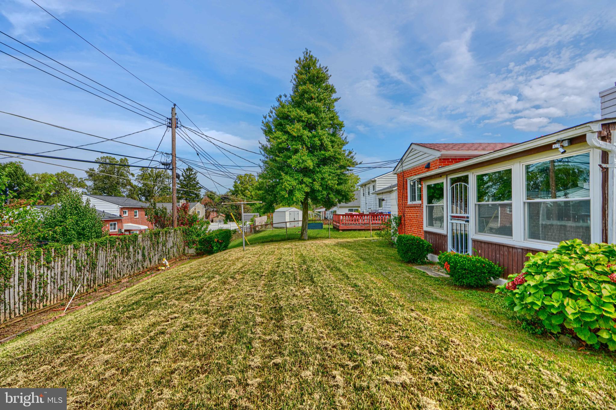 930 Sedgley Road Baltimore, MD 21228 - Photo 39 of 43 a house view with a garden space