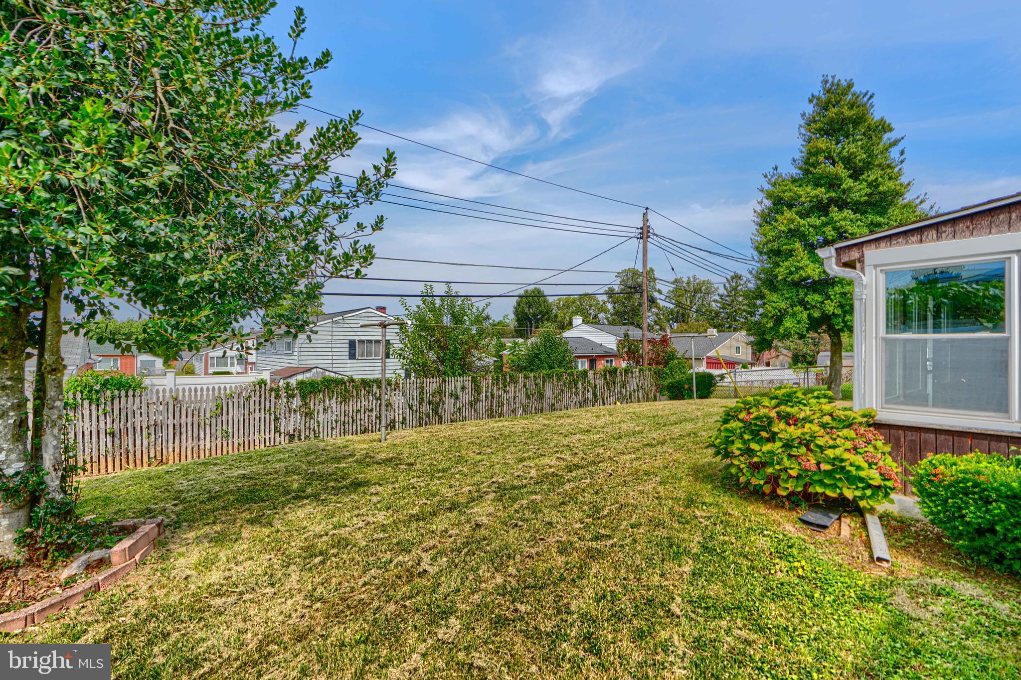 930 Sedgley Road Baltimore, MD 21228 - Photo 42 of 43 a view of a backyard