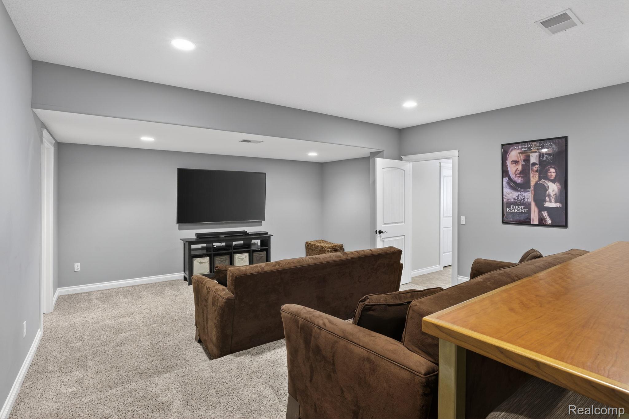 101 Highview Road Traverse City, MI 49696 - Photo 69 of 88 Living room featuring light colored carpet and recessed lighting