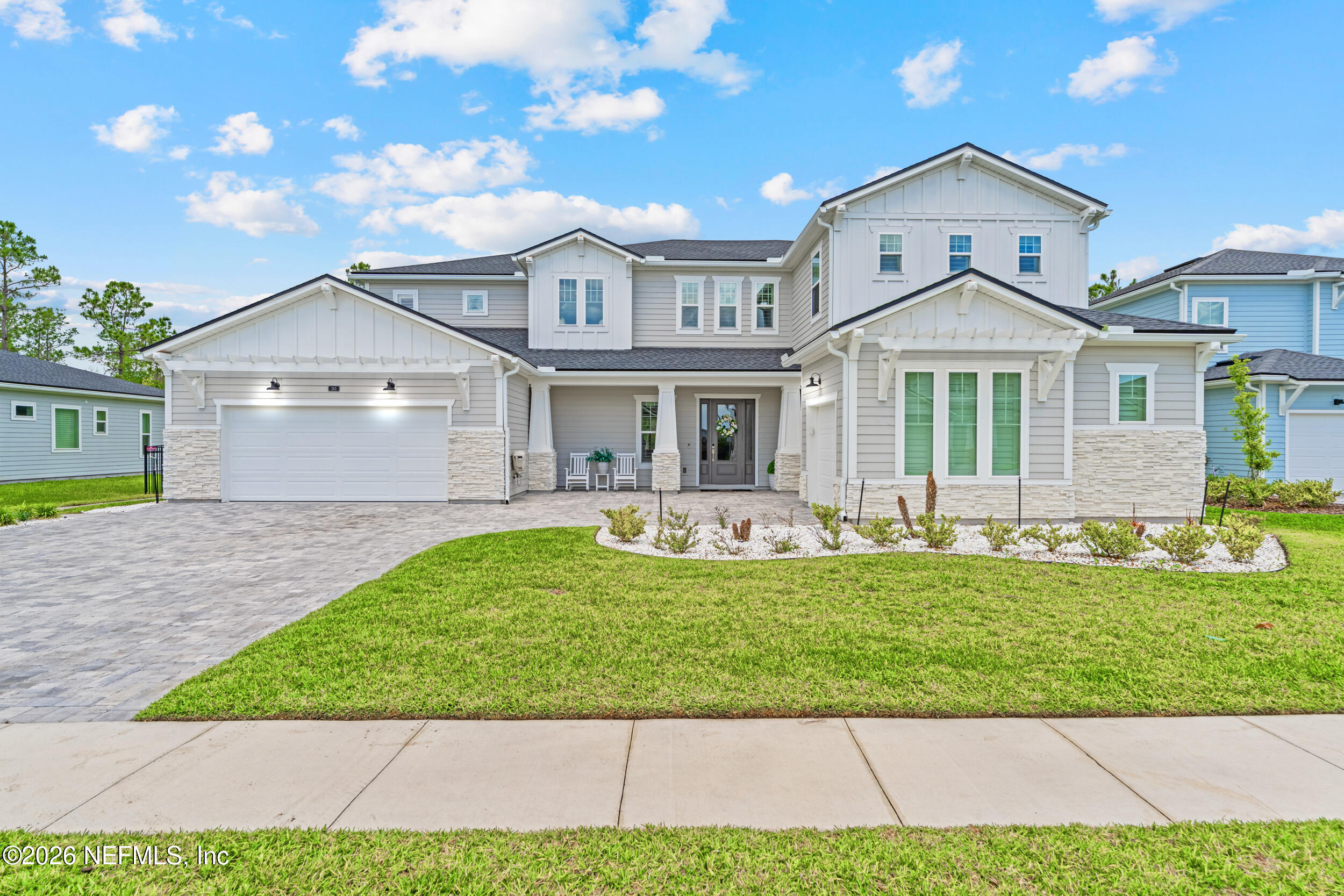 245 Ranch Land Circle St. Johns, FL 32259 - Photo 2 of 74 a front view of a house with a yard