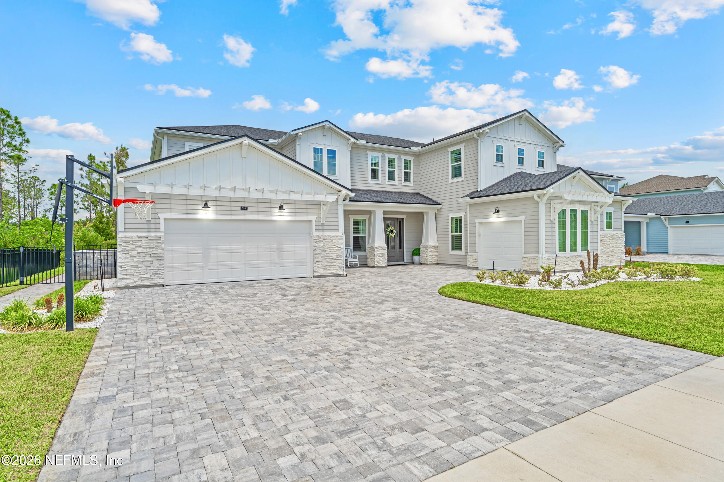 245 Ranch Land Circle St. Johns, FL 32259 - Photo 3 of 74 a front view of a house with a yard