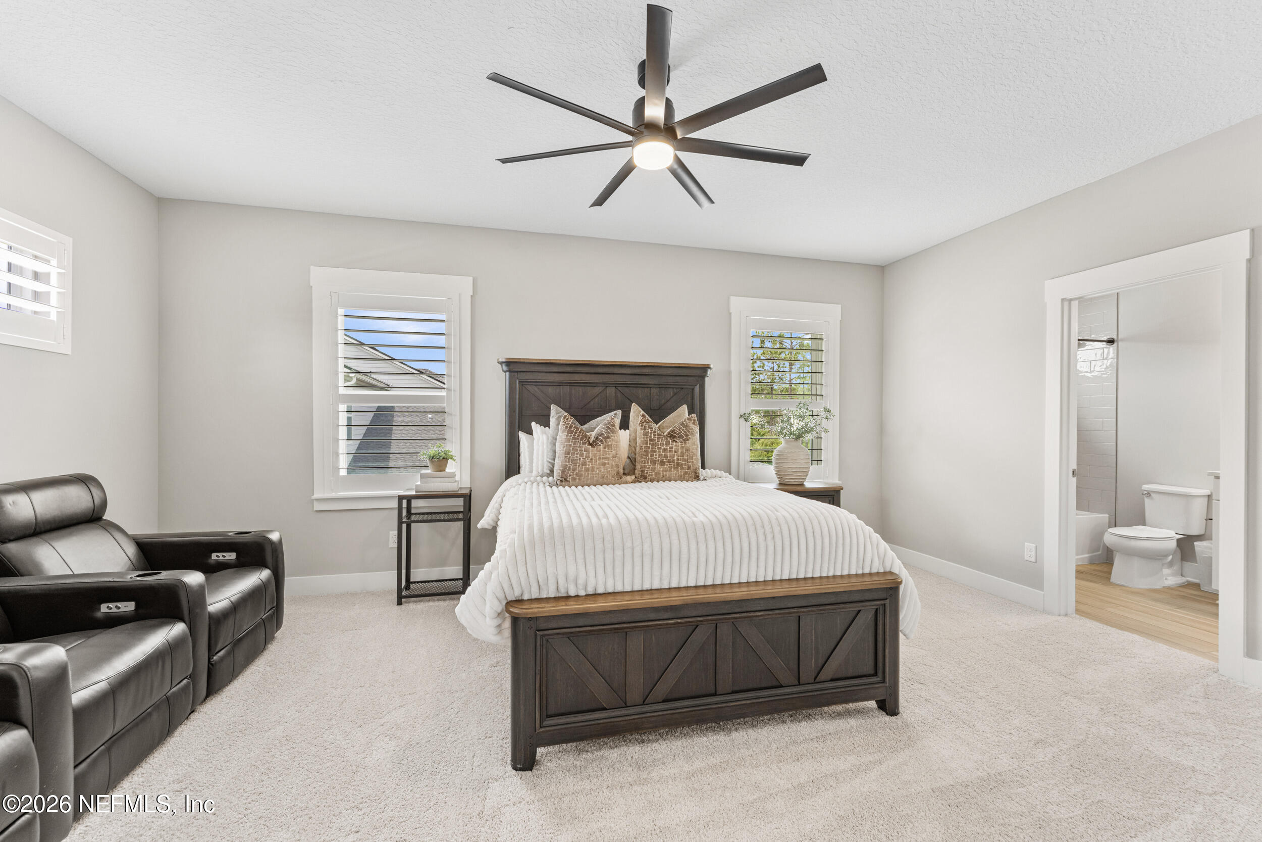 245 Ranch Land Circle St. Johns, FL 32259 - Photo 32 of 74 a bedroom with a bed and wooden floor
