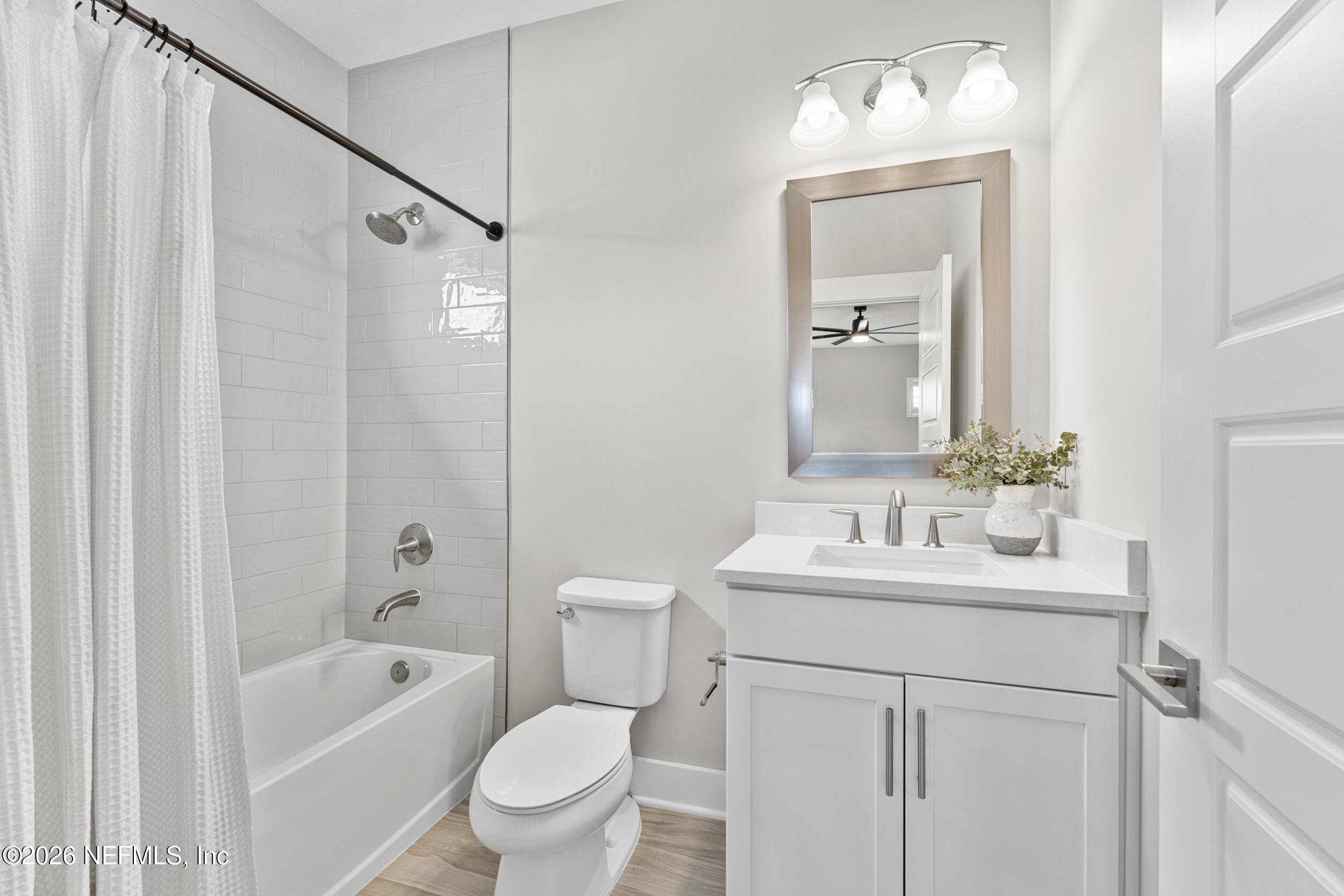 245 Ranch Land Circle St. Johns, FL 32259 - Photo 34 of 74 a bathroom with a sink toilet a shower and a mirror