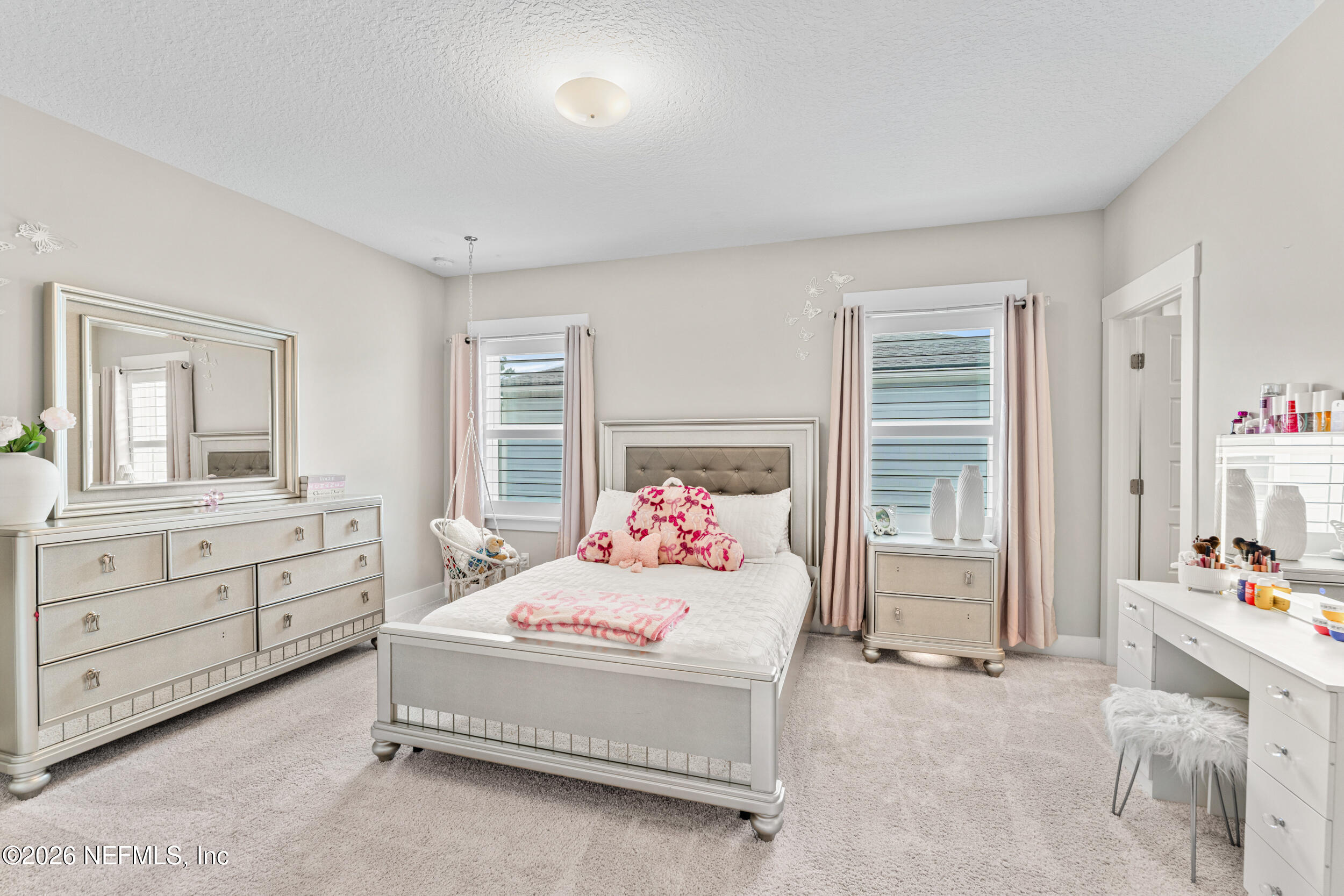 245 Ranch Land Circle St. Johns, FL 32259 - Photo 35 of 74 a bedroom with a bed and a dresser