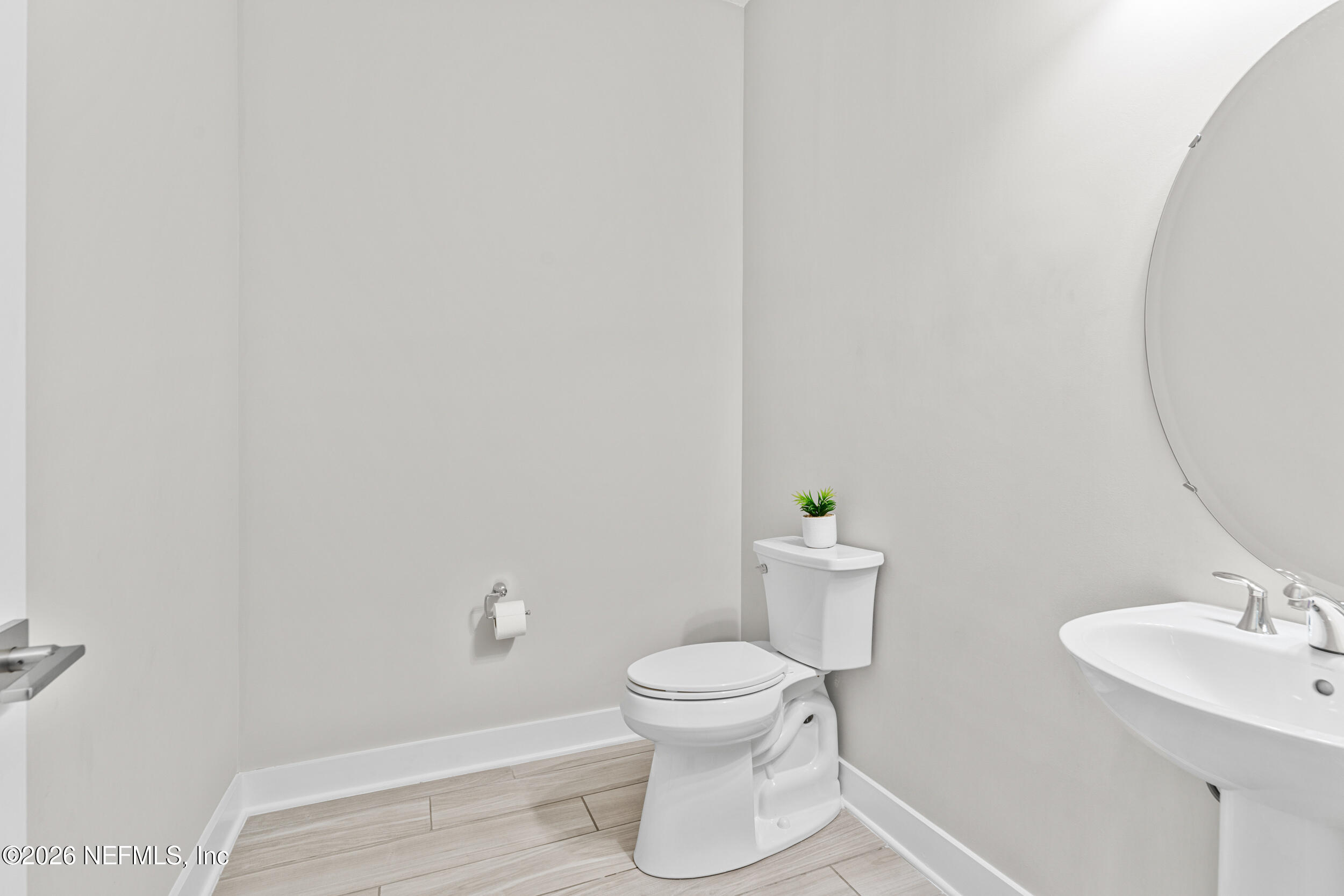 245 Ranch Land Circle St. Johns, FL 32259 - Photo 46 of 74 a bathroom with a toilet and a sink