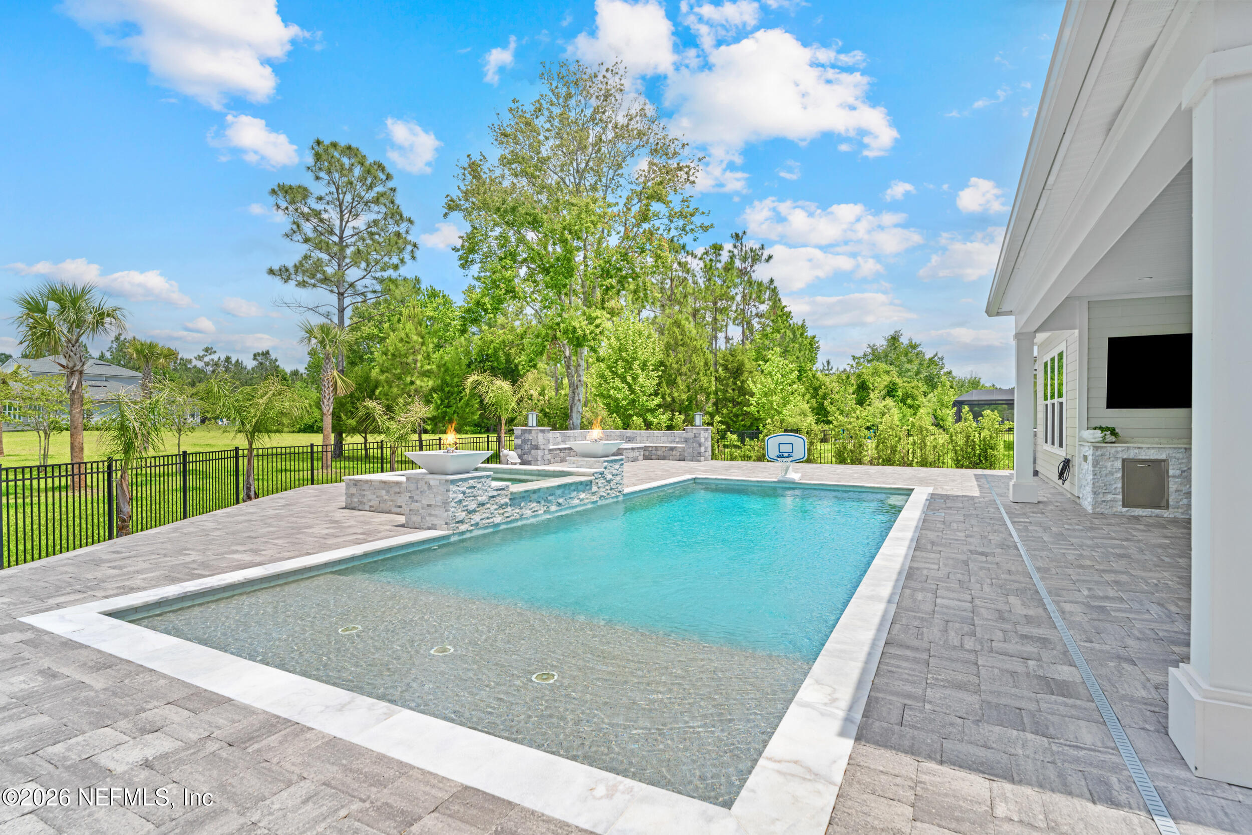 245 Ranch Land Circle St. Johns, FL 32259 - Photo 54 of 74 a view of a swimming pool with a patio