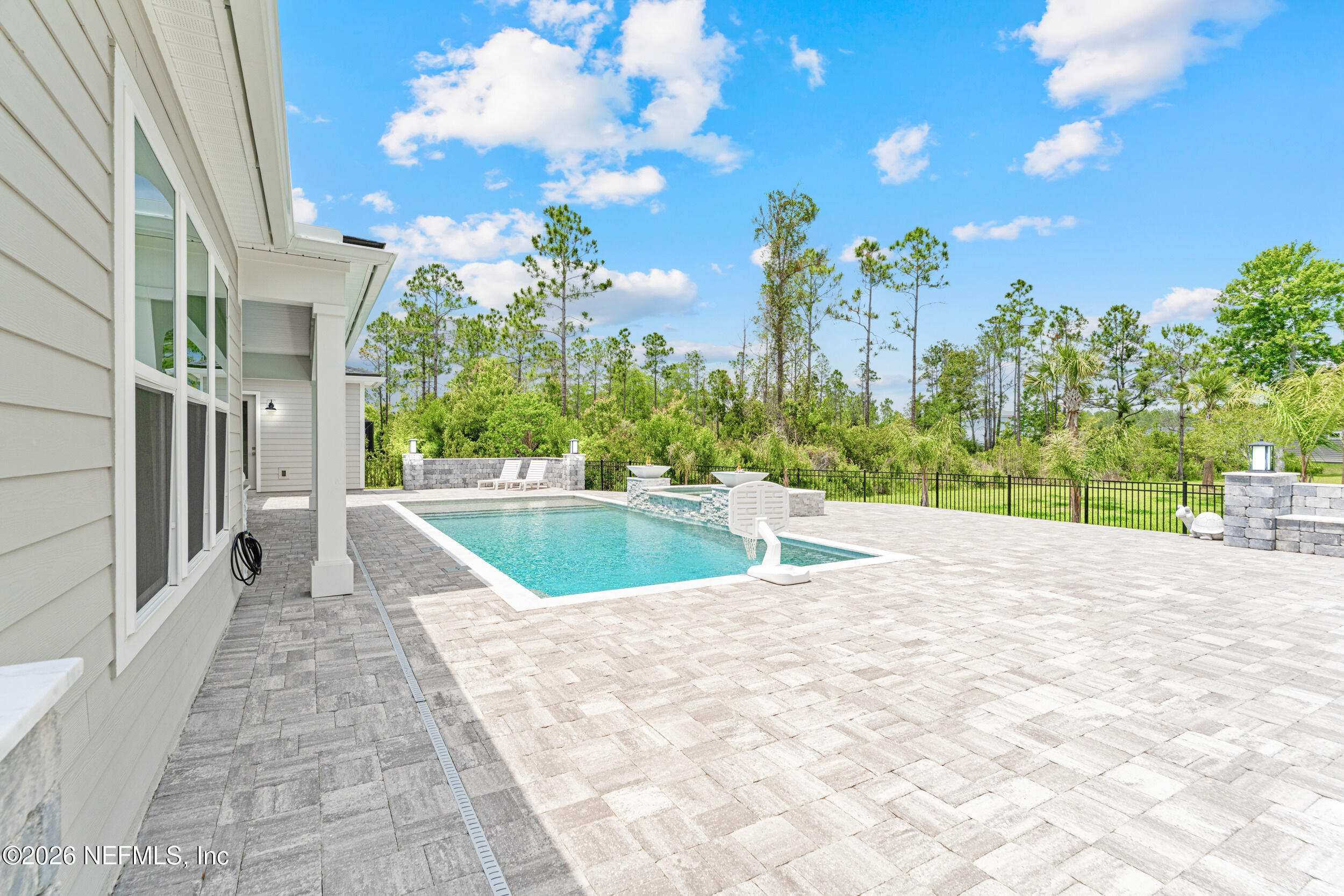 245 Ranch Land Circle St. Johns, FL 32259 - Photo 59 of 74 a view of a swimming pool with a yard