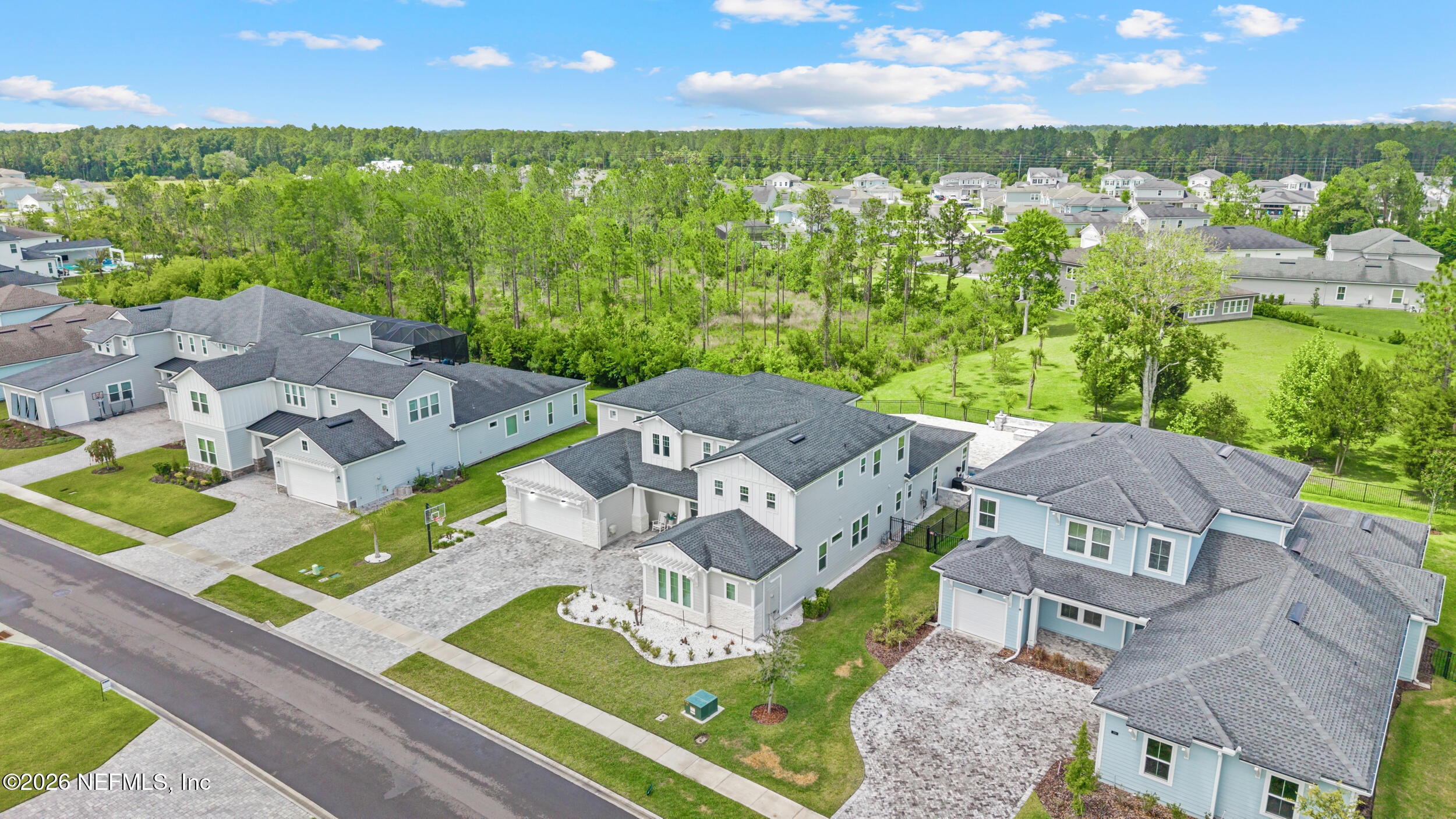 245 Ranch Land Circle St. Johns, FL 32259 - Photo 66 of 74 an aerial view of residential houses with outdoor space and street view