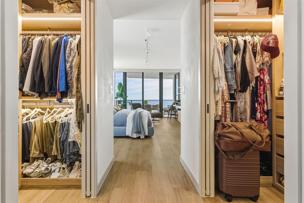 1116 North Ocean Boulevard, Unit 1506 Pompano Beach, FL 33062 - Photo 19 of 69 a view of walk in closet with clothes and shoes