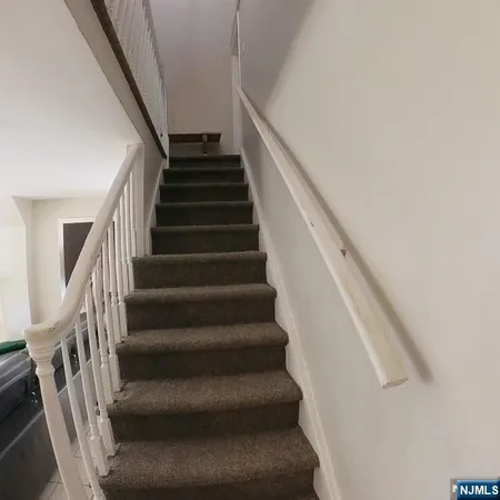 a view of a hallway with closet