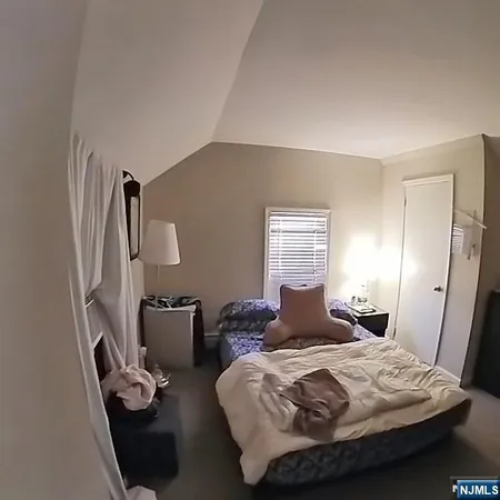 a living room with furniture rug and window