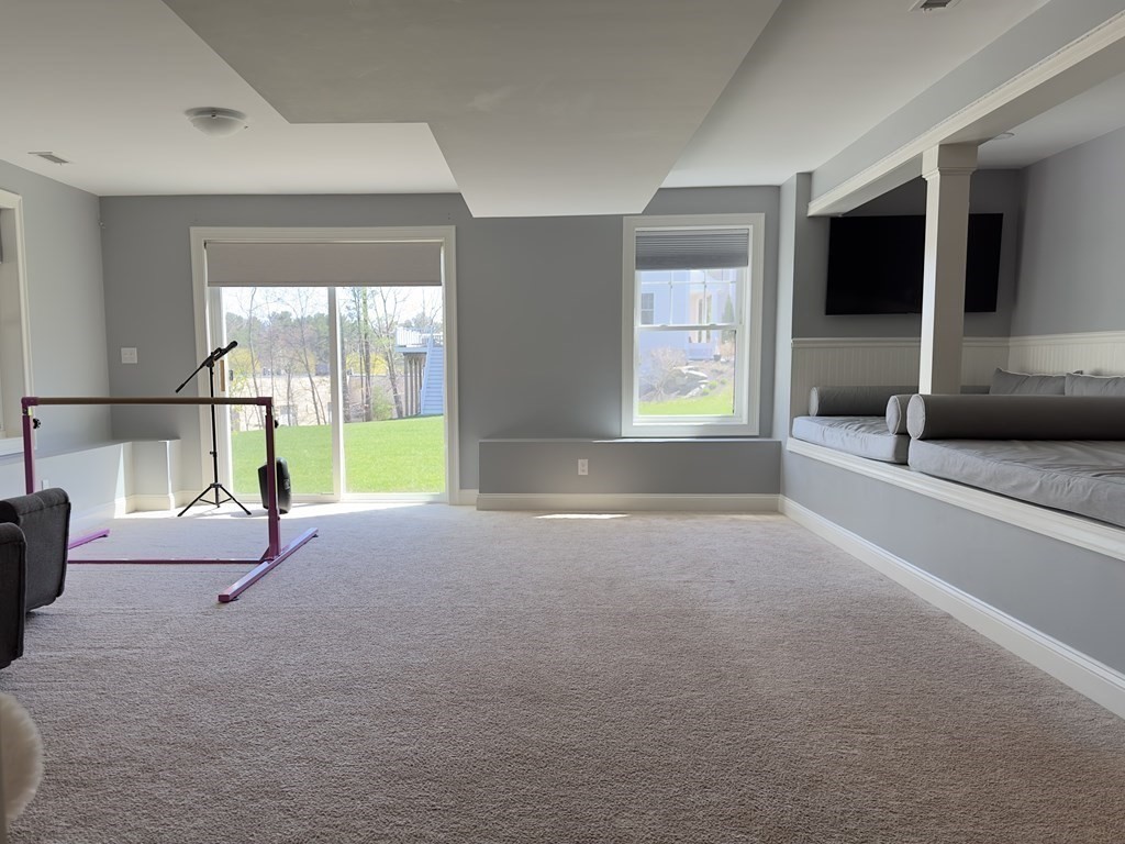 47 Quarry Road, Unit 47 Acton, MA 01720 - Photo 8 of 15 a living room with furniture and a large window