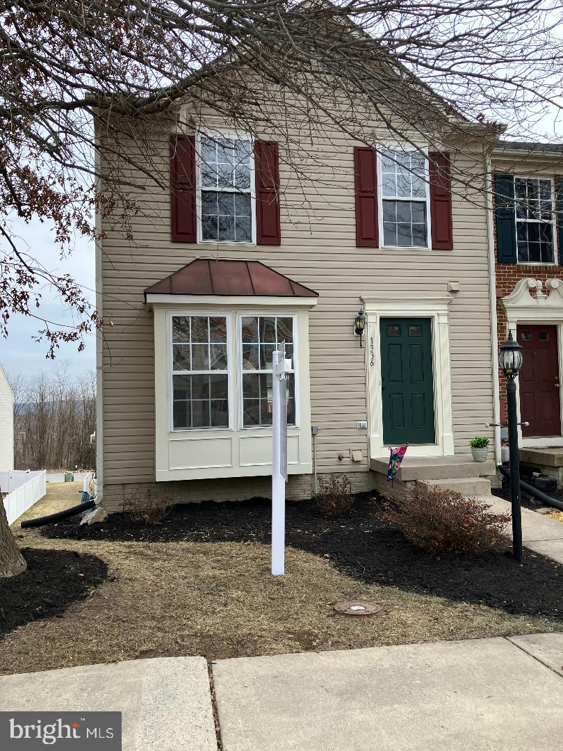 1336 Steed Street Ranson, WV 25438 - Photo 1 of 15 a front view of a house with a yard