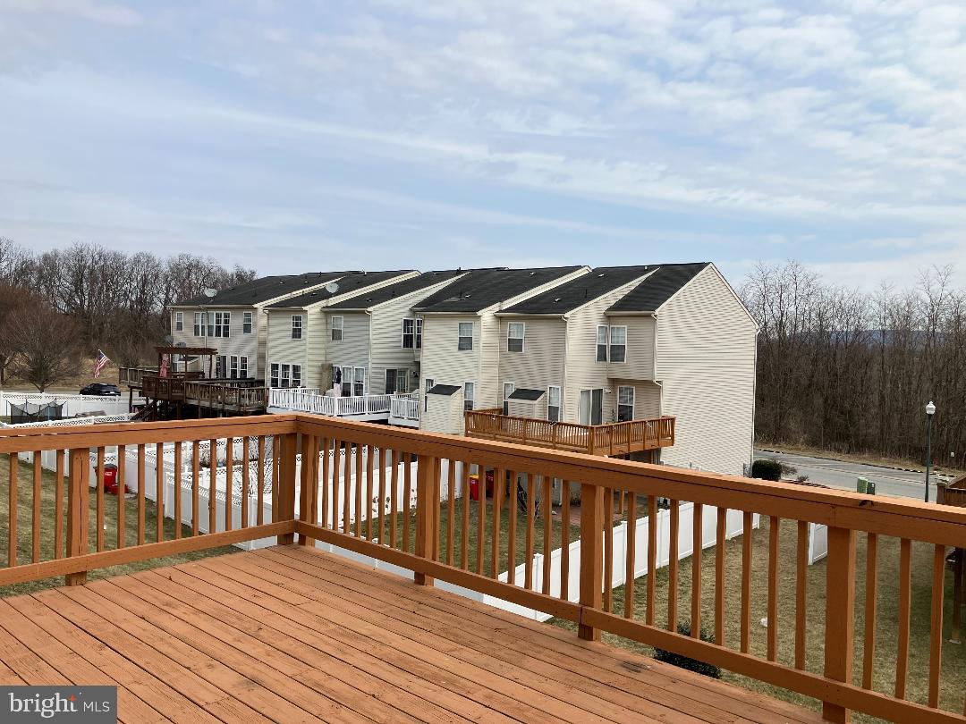 1336 Steed Street Ranson, WV 25438 - Photo 11 of 15 a view of a house with wooden deck