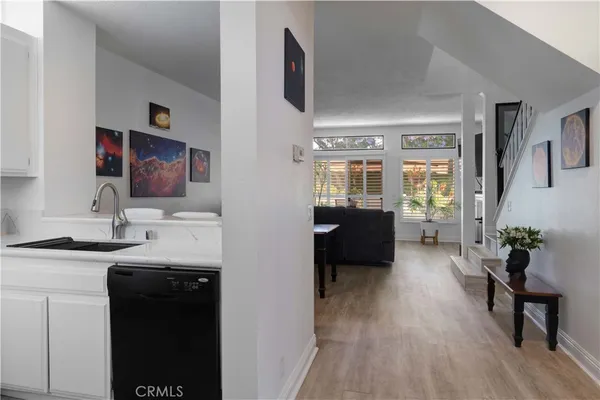 a view of a living room and dining room