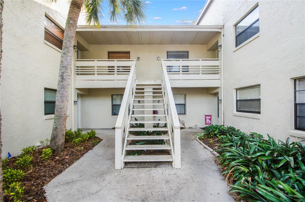 439 South Netherwood Crescent, Unit 202 Altamonte Springs, FL 32714 - Photo 1 of 27 front view of a house with a porch