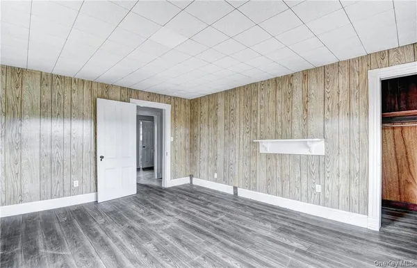 a view of a livingroom with wooden floor