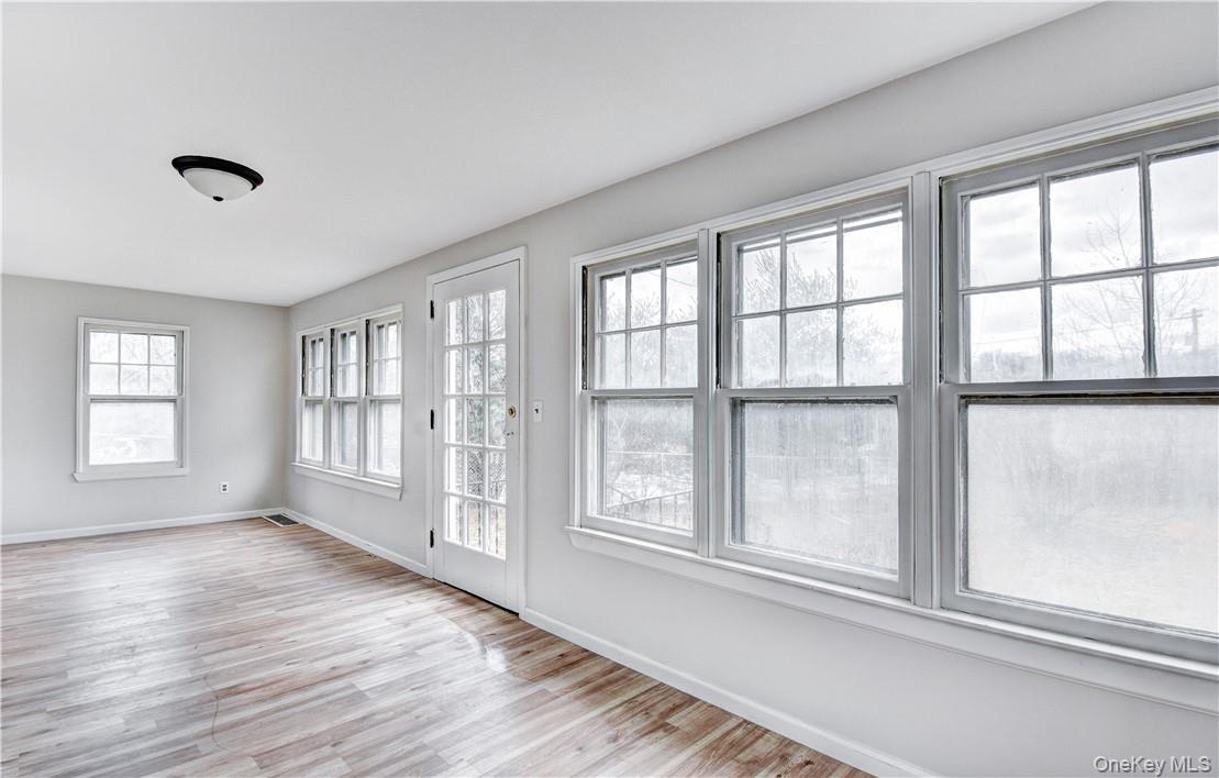 202 Midland Lake Road Middletown, NY 10941 - Photo 5 of 26 a view of an empty room with a window