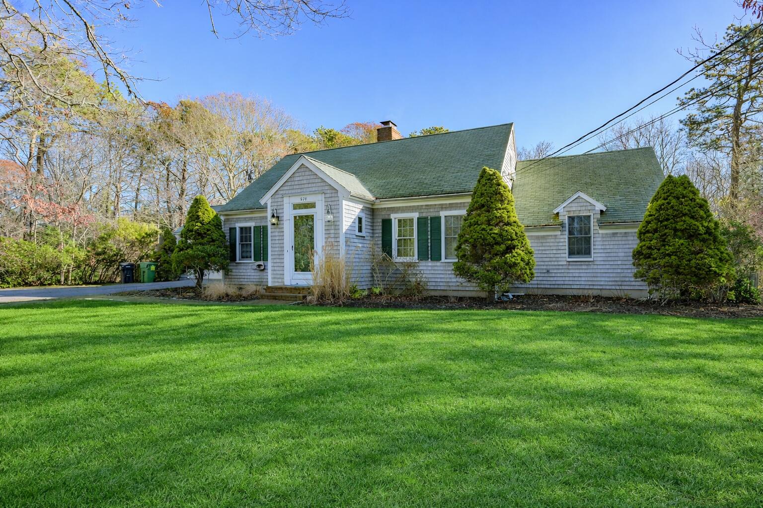 578 Huckins Neck Road Centerville, MA 02632 - Photo 2 of 51 Charming Cape Cod home at midday