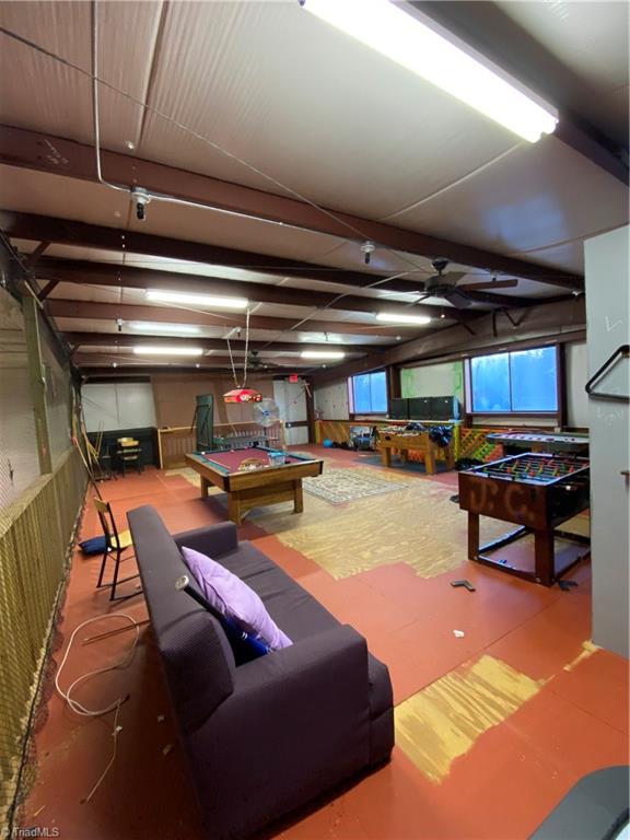 7200 Summerfield Road Summerfield, NC 27358 - Photo 14 of 27 Youth/Family center: loft with games/equipment remaining.
