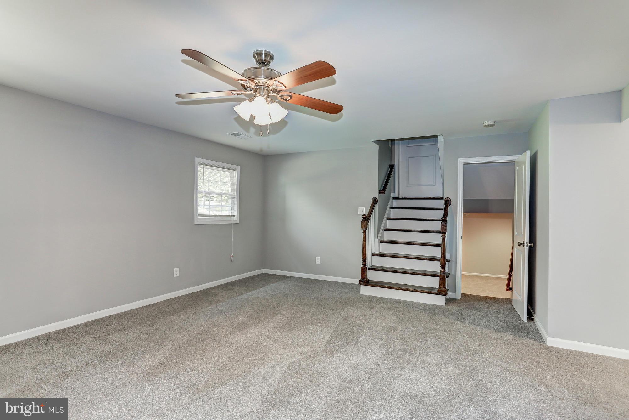 11239 Handlebar Road Reston, VA 20191 - Photo 22 of 30 a view of an empty room with a window