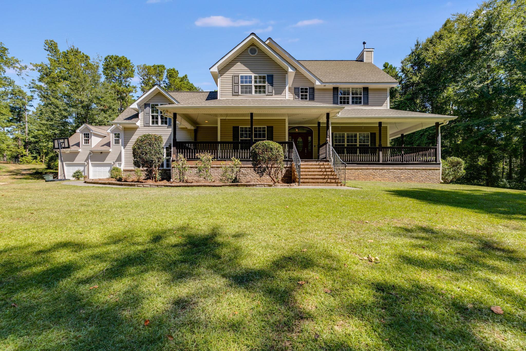 75 Riverside Street Franklin, GA 30217 - Photo 1 of 1 a front view of house with yard and green space