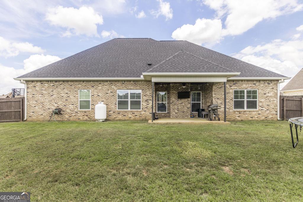 113 Flat Rock Lane Perry, GA 31069 - Photo 36 of 39 a front view of a house with garden