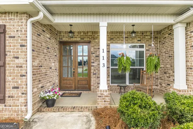 a view of a entryway door front of house