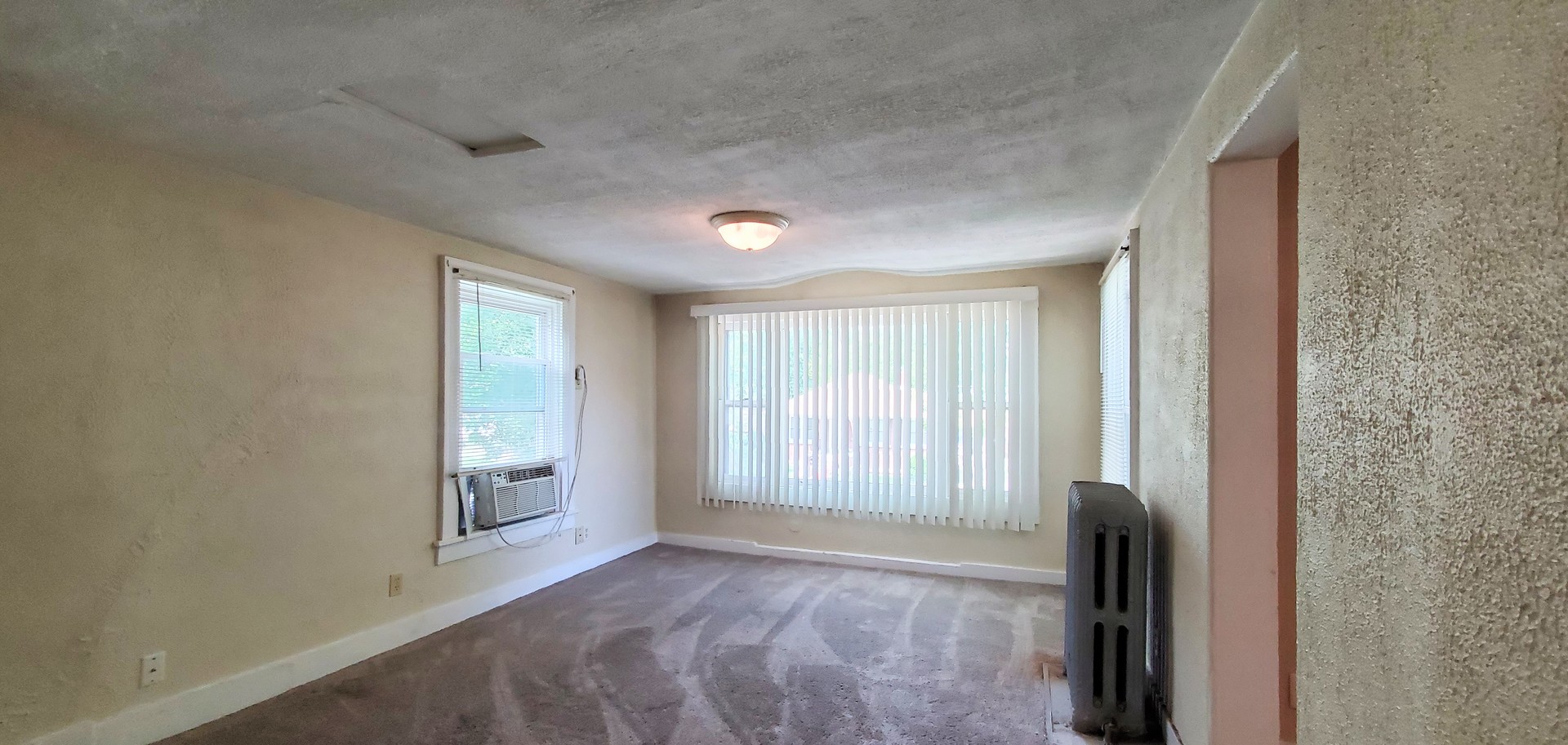 414 Oneida Street, Unit 1UPPER Joliet, IL 60435 - Photo 4 of 9 a view of an empty room and window
