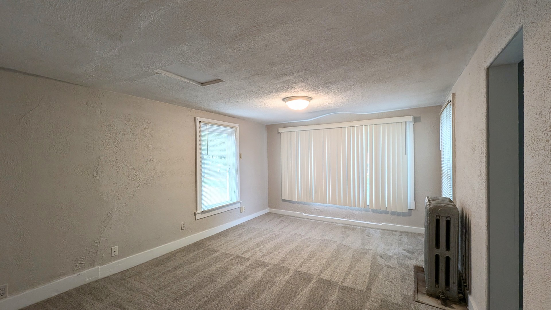 414 Oneida Street, Unit 1UPPER Joliet, IL 60435 - Photo 8 of 9 an empty room with windows