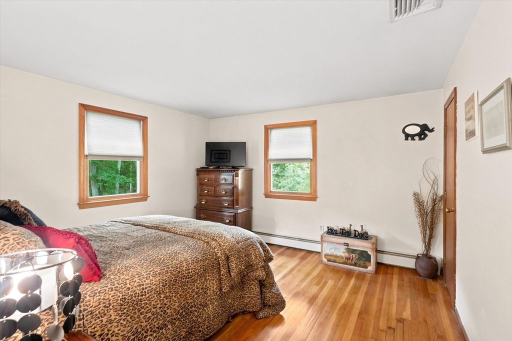 11 Marlboro Road Georgetown, MA 01833 - Photo 22 of 42 a bedroom with a bed and a window