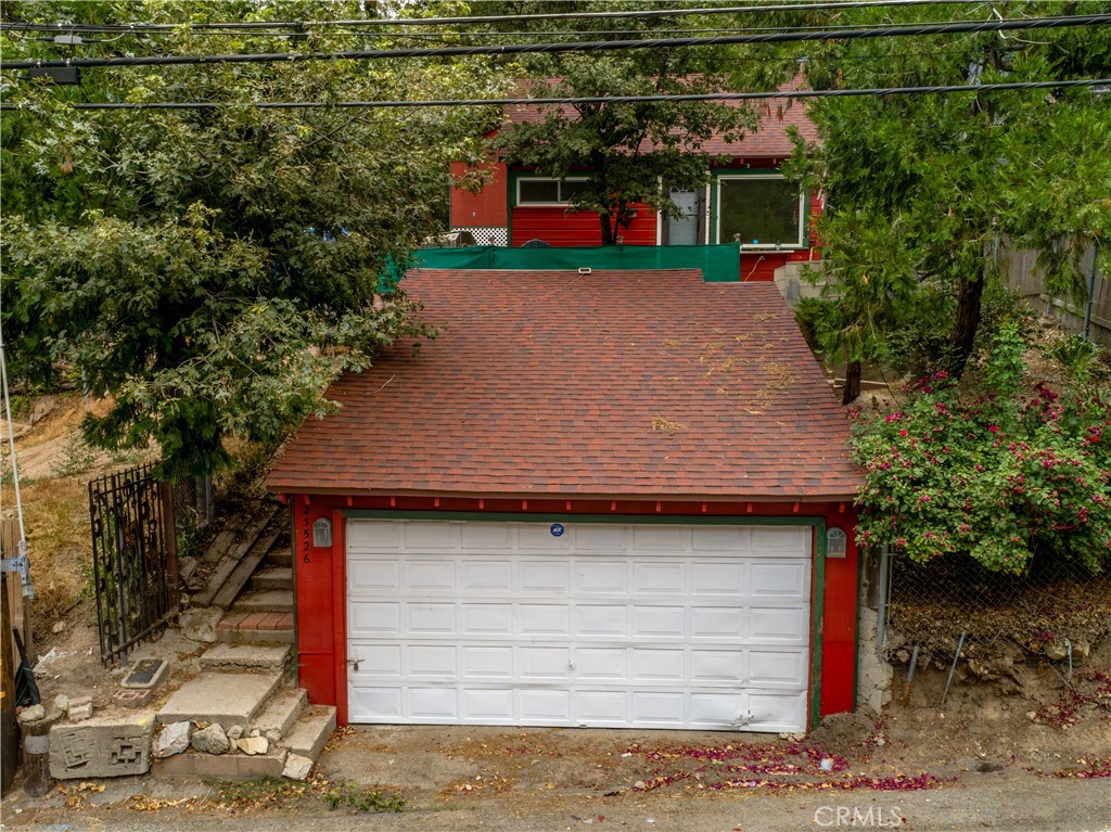 23526 Knapps Cutoff Crestline, CA 92325 - Photo 26 of 30 a small pool front view of a house