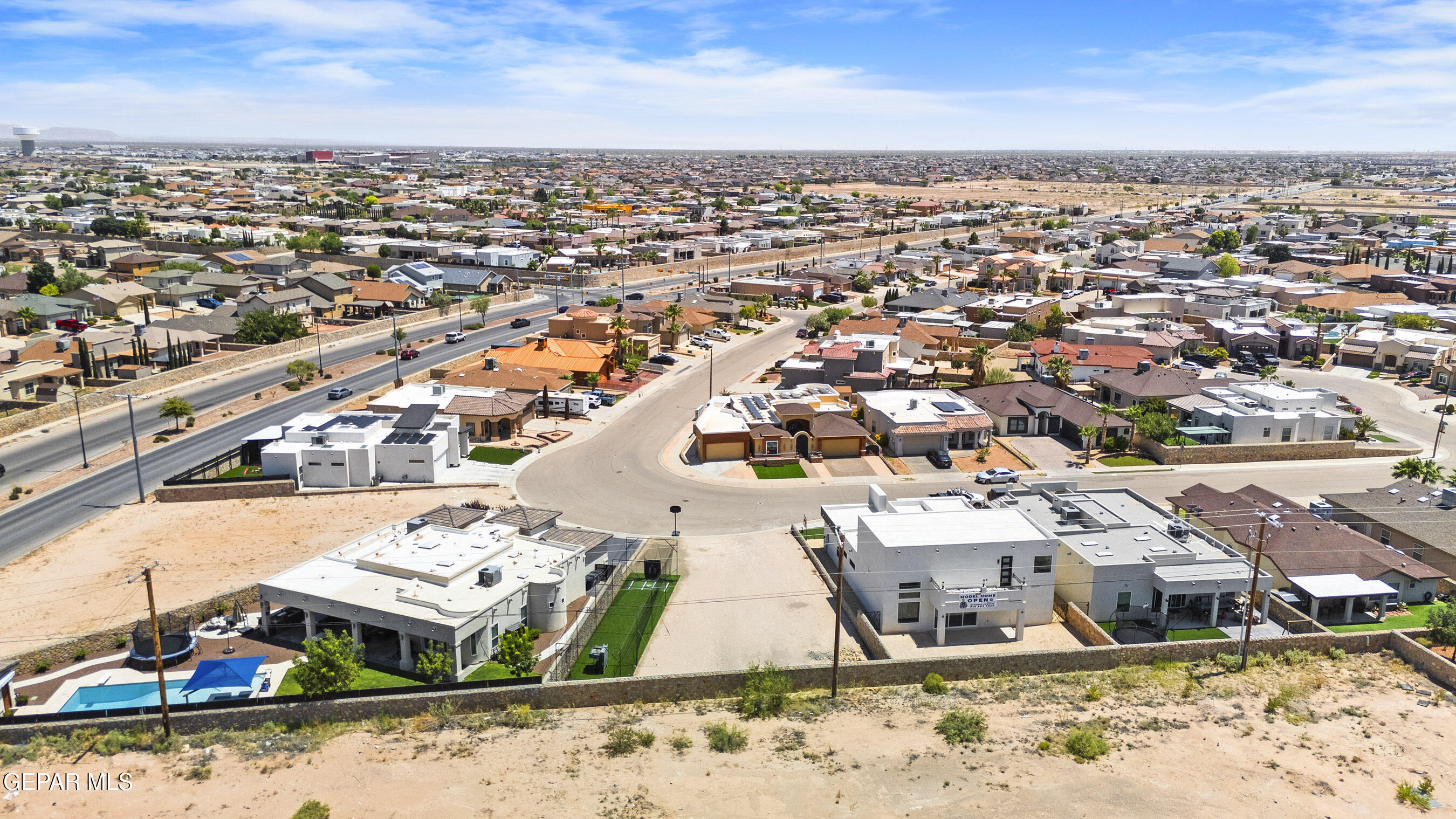 3145 Tunnel Point Way El Paso, TX 79938 - Photo 18 of 20 an aerial view of a residential building and car parked