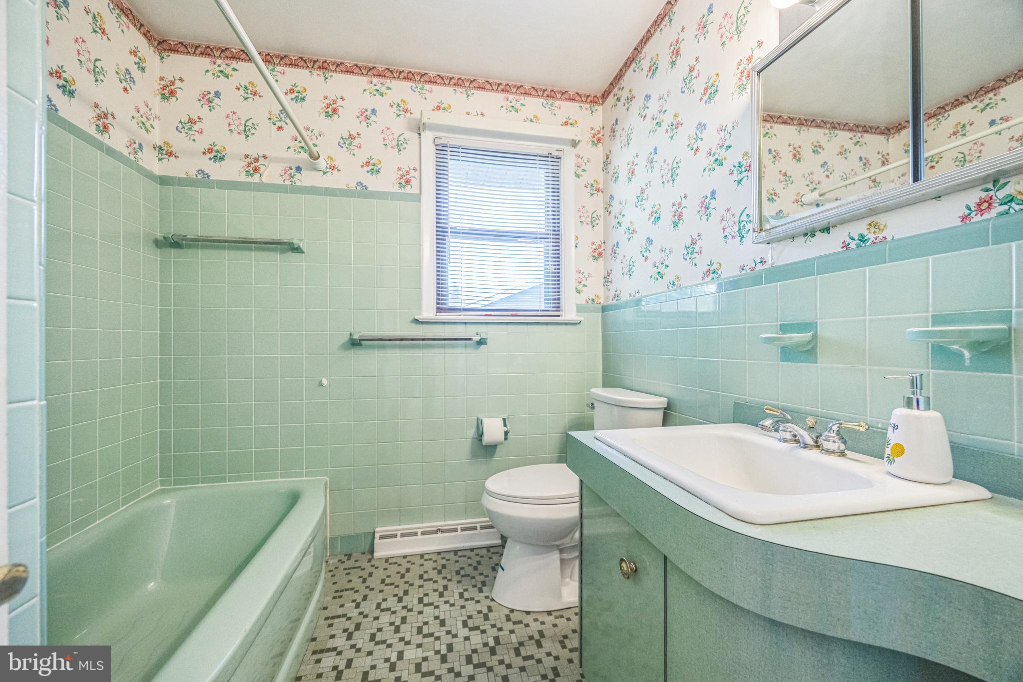 835 Wayside Lane Haddonfield, NJ 08033 - Photo 19 of 36 a bathroom with a sink a toilet and shower