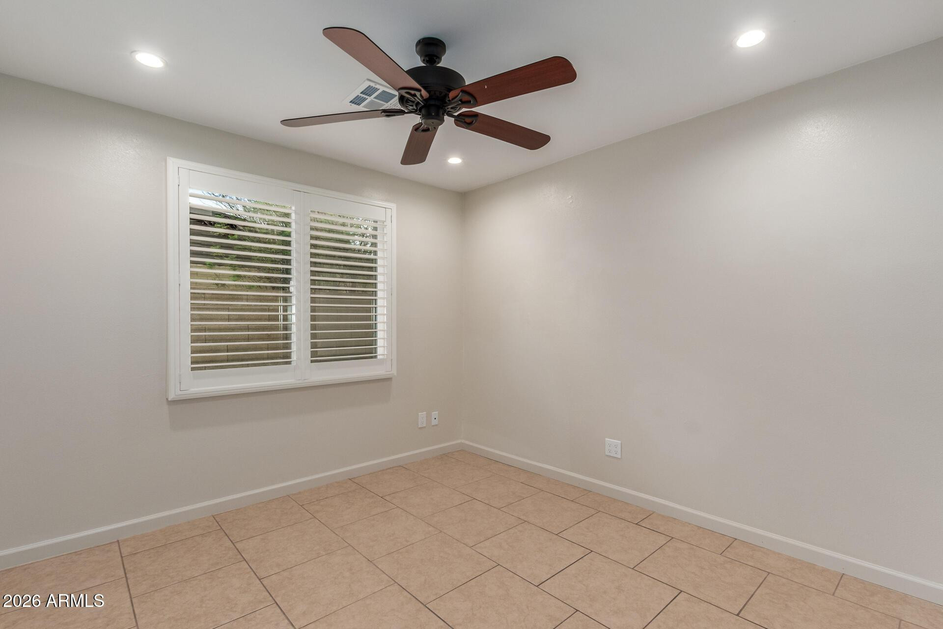 1628 East Del Rio Drive Tempe, AZ 85282 - Photo 24 of 32 a view of an empty room with a window