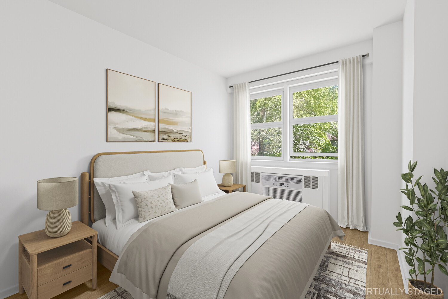 245 East 35th Street, Unit 4H Manhattan, NY 10016 - Photo 2 of 5 a bedroom with a bed and a potted plant