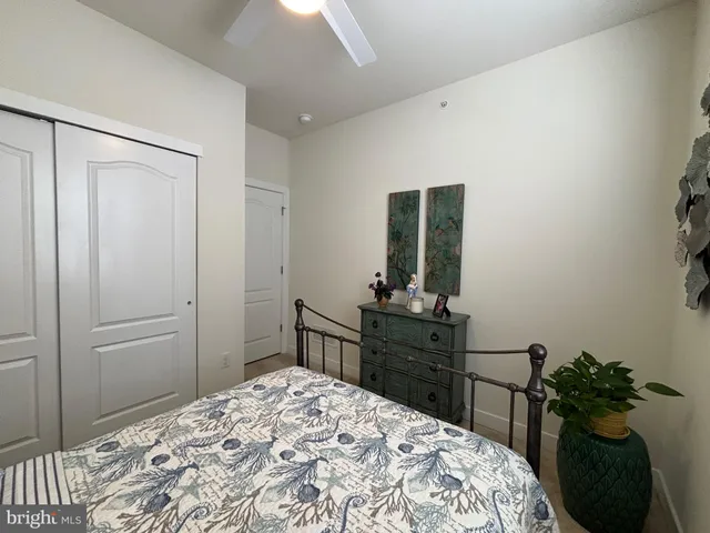 a bathroom with a toilet and a bathtub