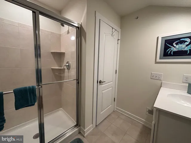 a view of a house with a yard and a garage