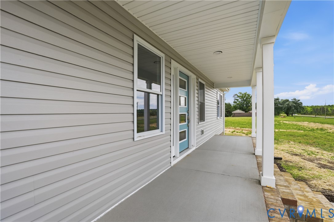 7839 King William Road Aylett, VA 23009 - Photo 5 of 38 a view of a house with a outdoor space